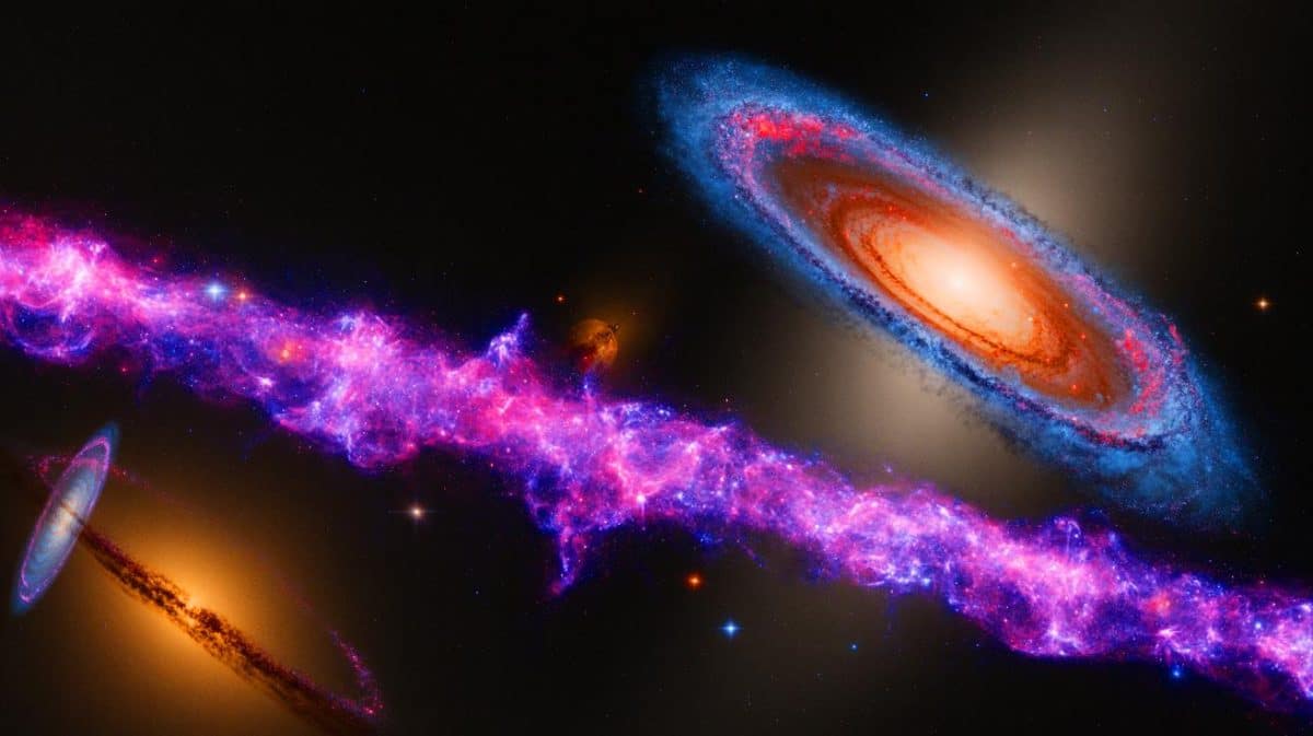 This Galactic Phenomenon Reveals Secrets That Could Shatter Everything We Know About The Universe’s Evolution Illustration of a massive hydrogen bridge linking two dwarf galaxies in space.
